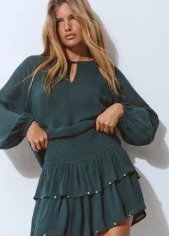 Blusa cut outs
