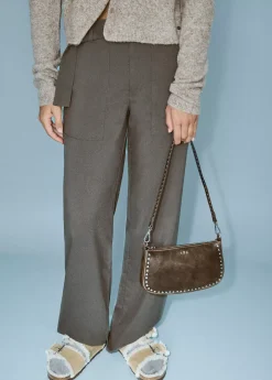 Bolso piel tachas