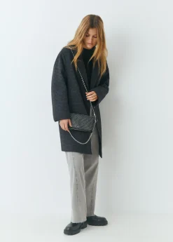 Bolso solapa tachitas