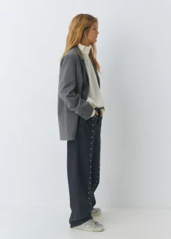Pantalón tachas estrellas