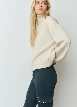 Pantalon campana cargo tachas